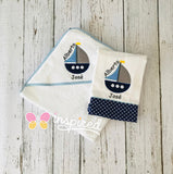 Sailboat Themed Hooded Towel and One Burp Cloth.