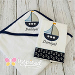 Sailboat Themed Hooded Towel and One Burp Cloth.